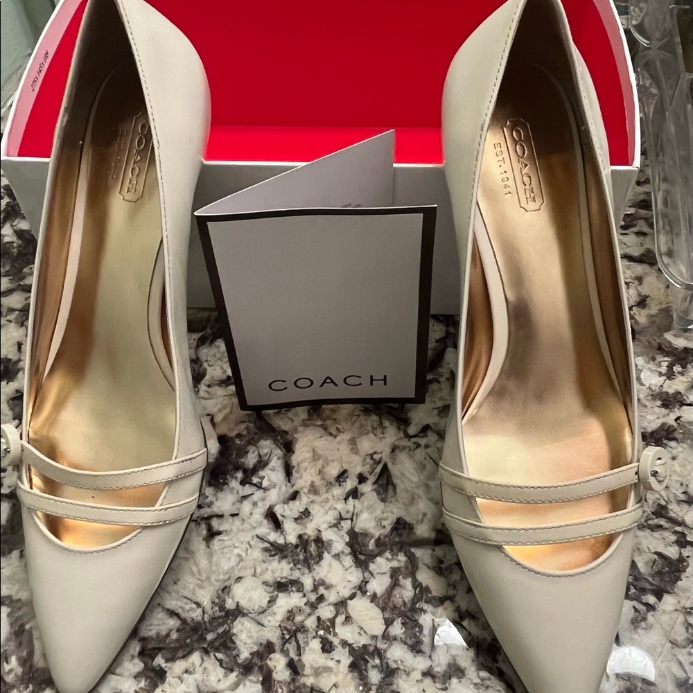 Coach size 7 cream color shoes.